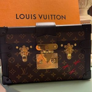 Louis Vuitton  Authentic Petite Malle Like New Dust Bag Included.
